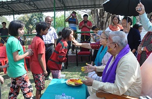 The Governor of Arunachal Pradesh Shri PB Acharya and State�s First Lady Smt Kavita Acharya celebrate the festive occasion of Holi with differently abled childrens of Donyi-Polo Mission School for the hearing and visually impaired, Chimpu  on 13th March 2017. 